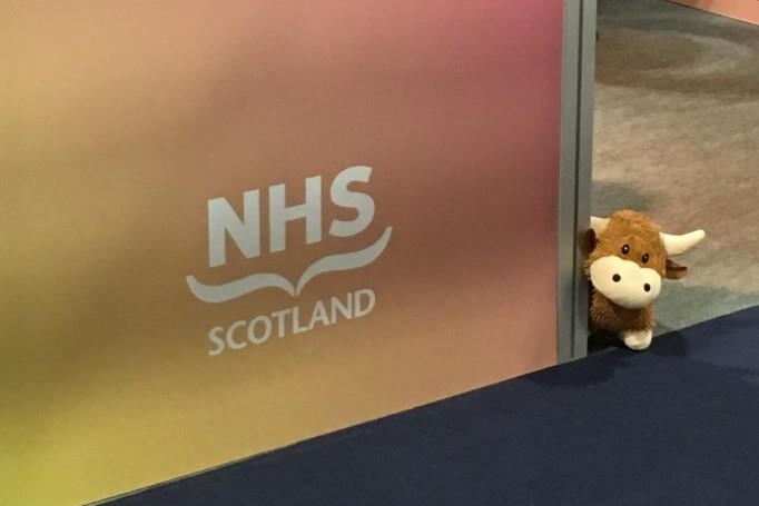 SRMC Mascot with NHS Scotland Logo